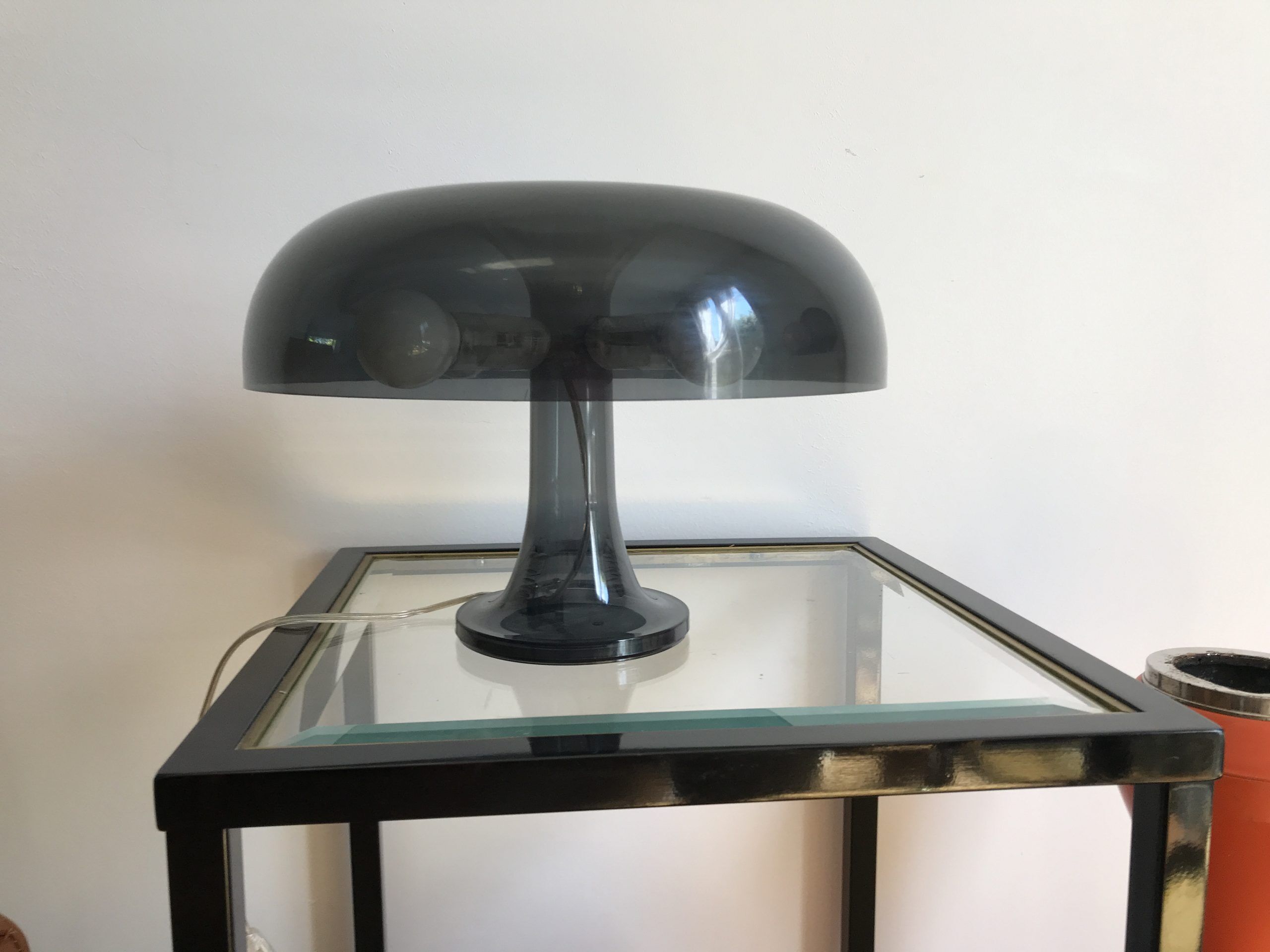 Nessino black pose lamp for artemide by giancarlo mattioli