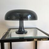 Nessino black pose lamp for artemide by giancarlo mattioli
