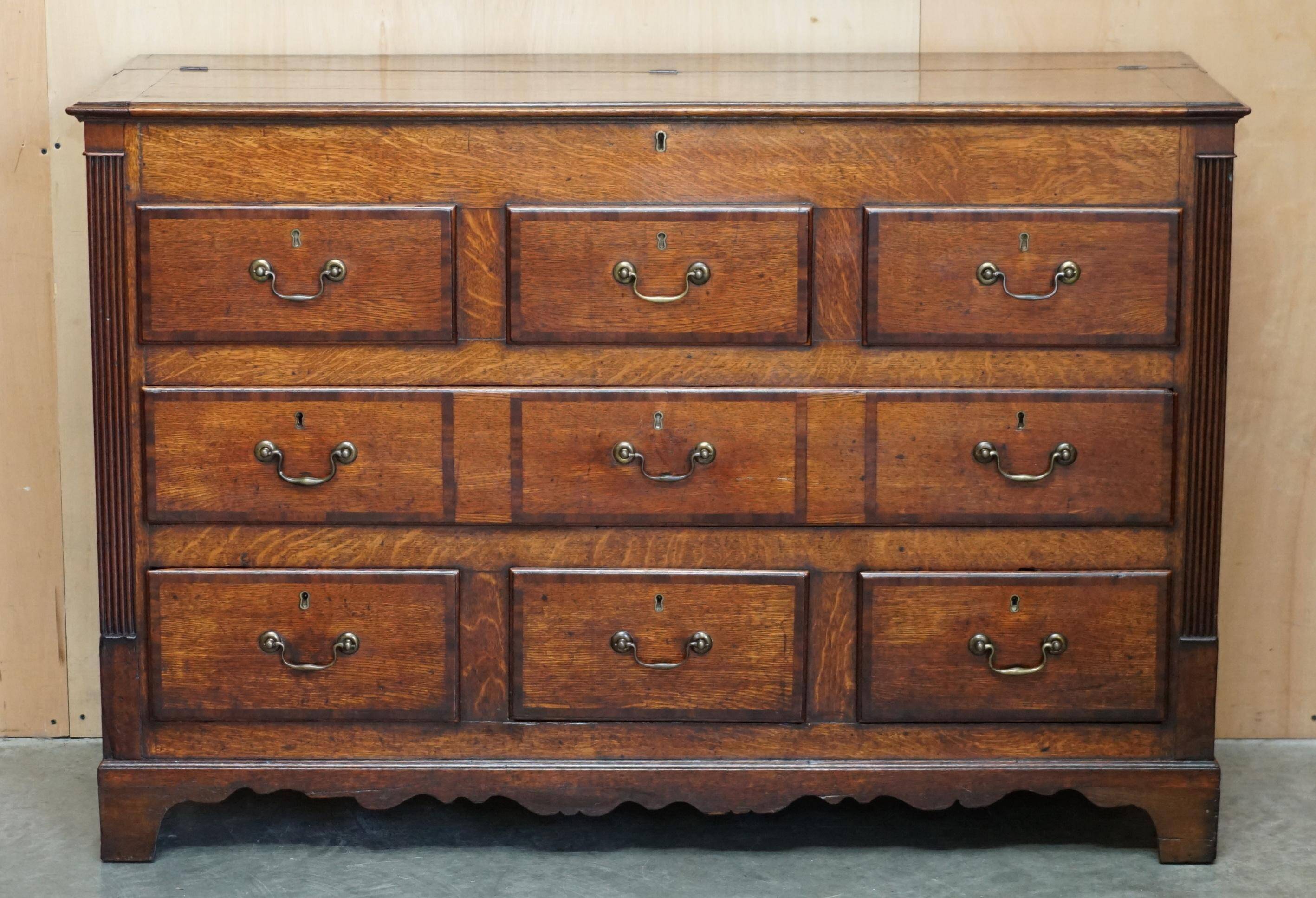 Georgian oak commode with a folding top, English, 18th century.