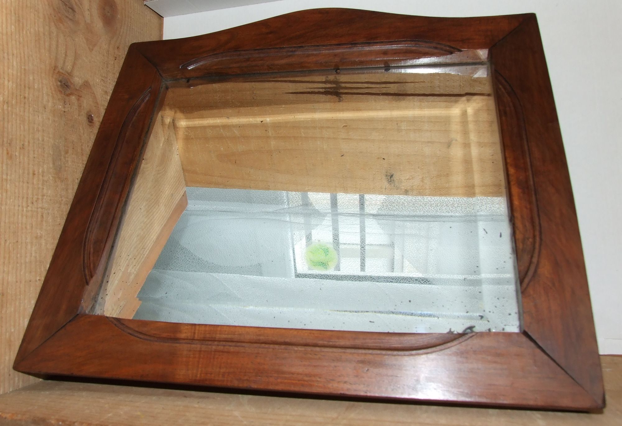 Ancient mirror bevelled wooden frame