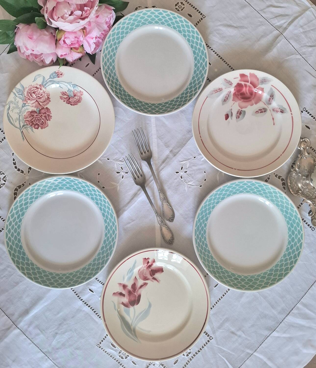 Mismatched antique flat plates in earthenware.