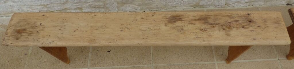 Two benches in their solid wood patinas