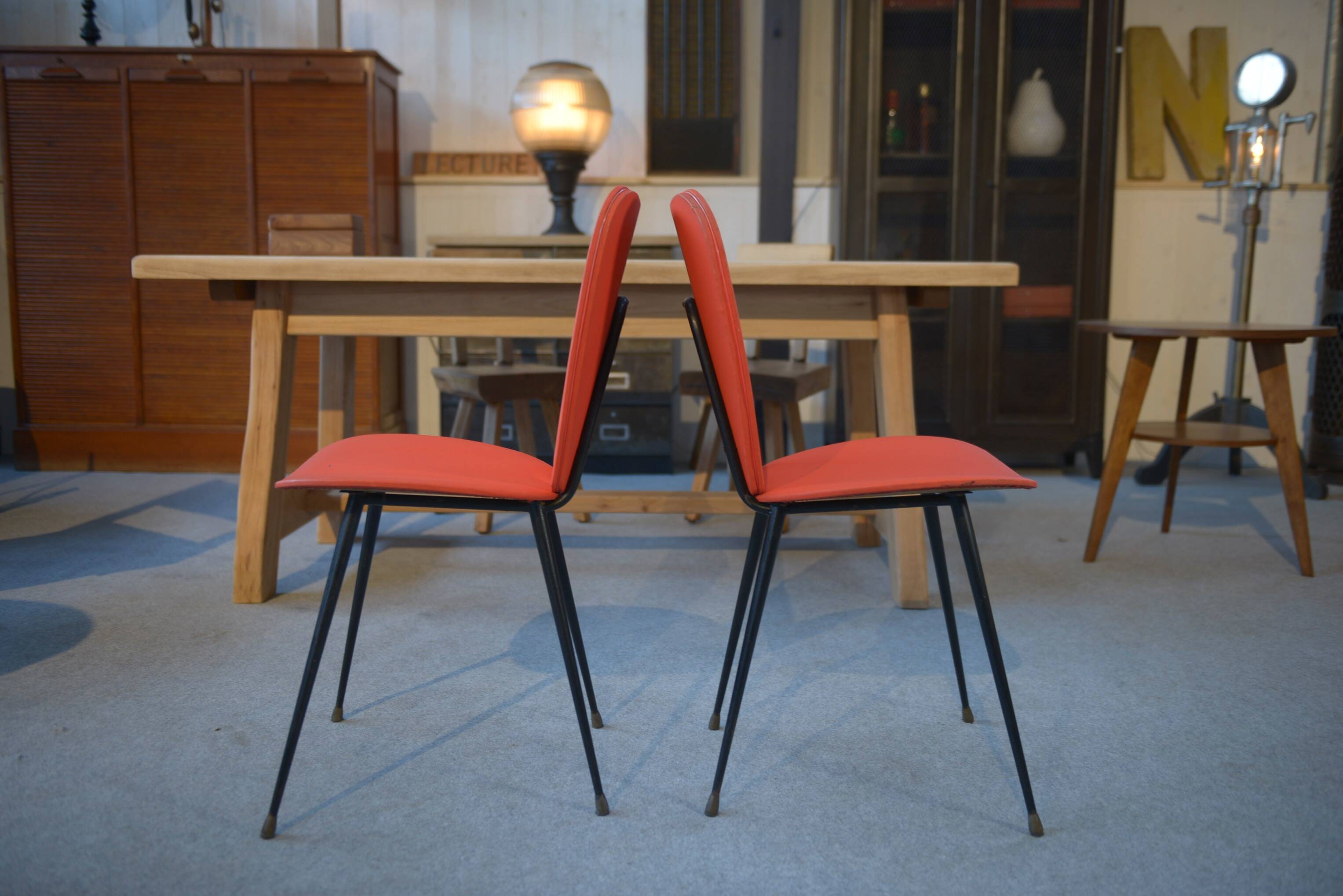 Set of 2 red leatherette chairs from the 1960s