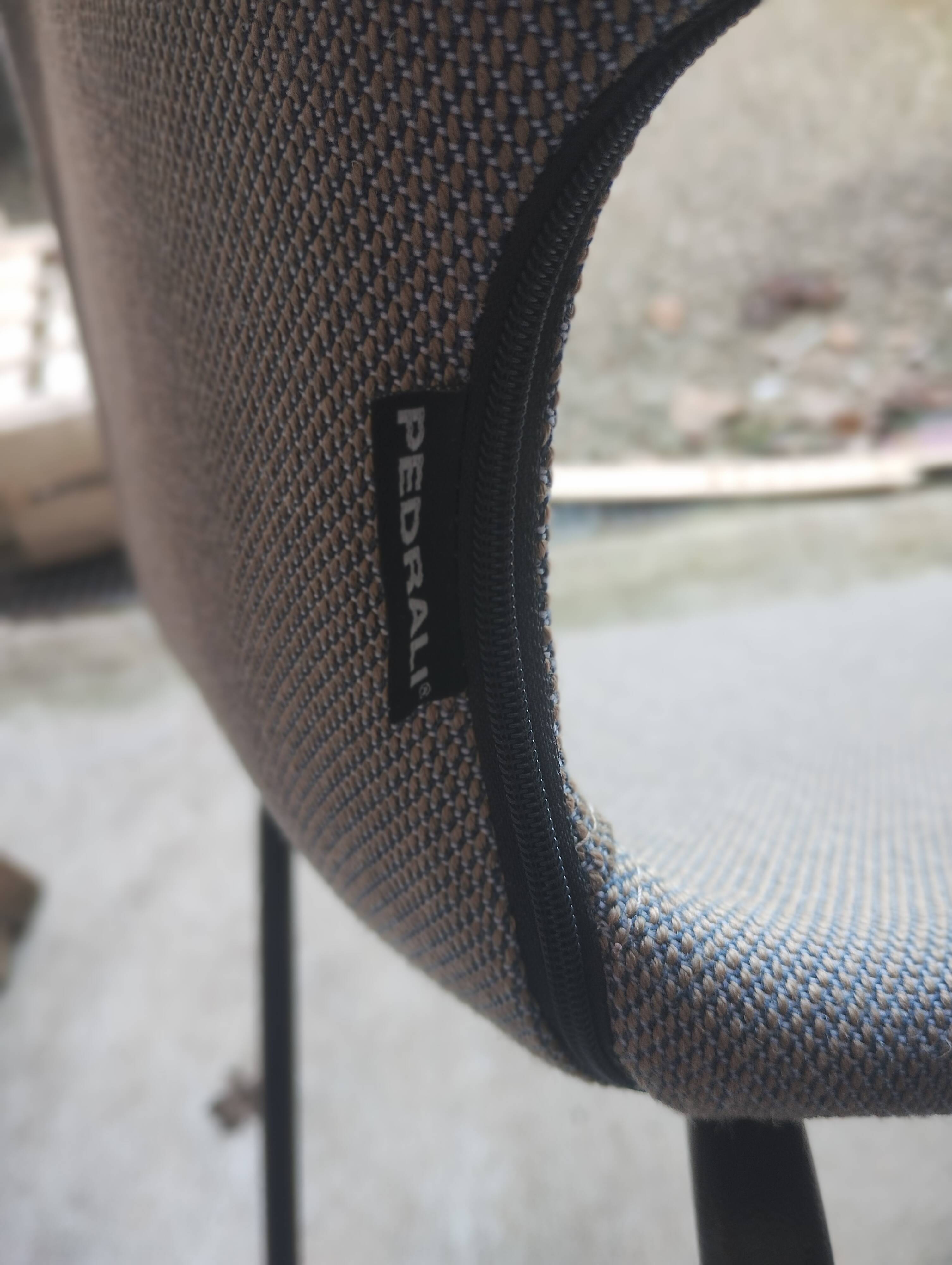 Pedrali Babila fabric armchair with black ash legs.
