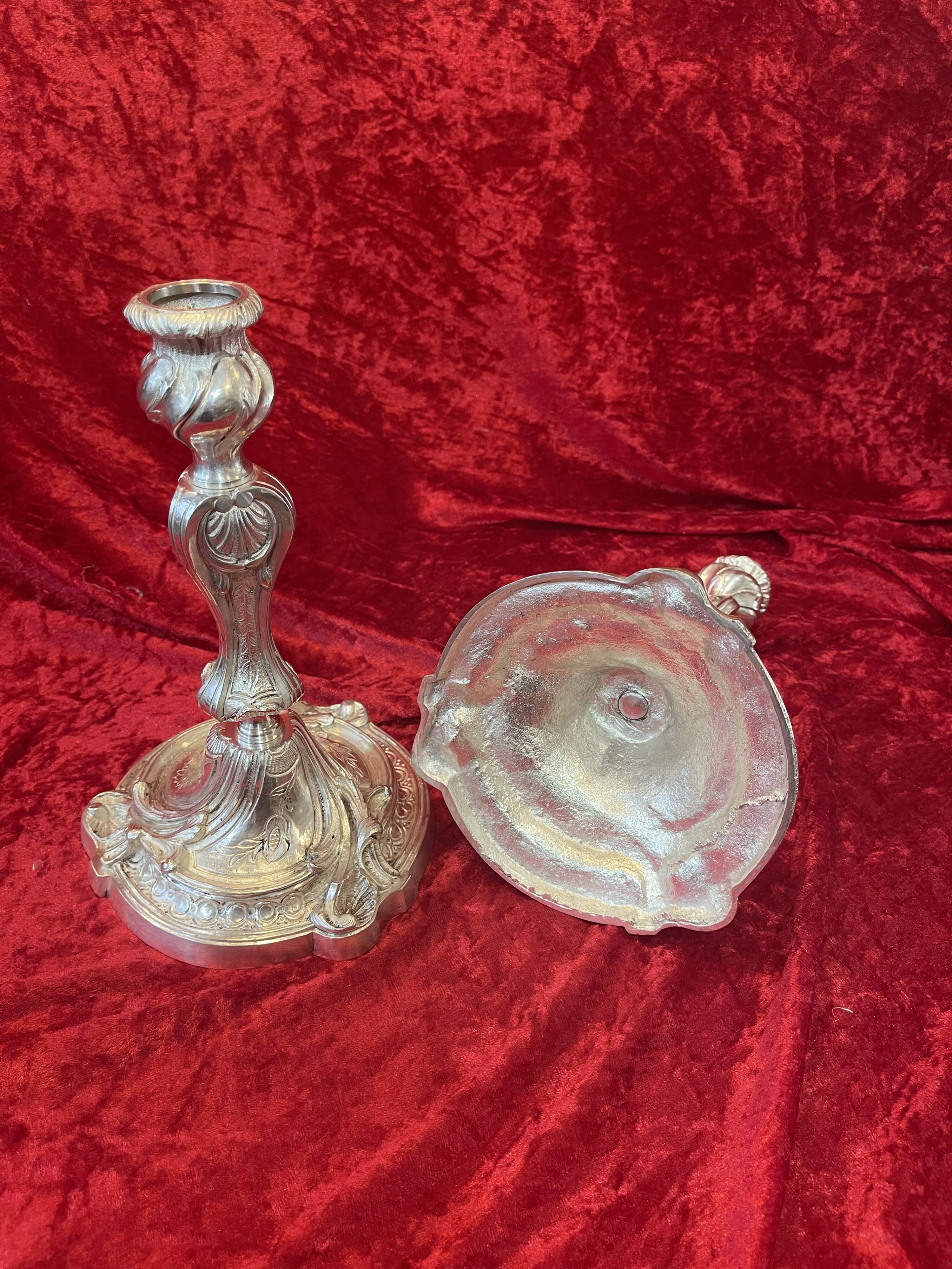 Pair of candlesticks, torches in silver bronze