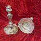 Pair of candlesticks, torches in silver bronze