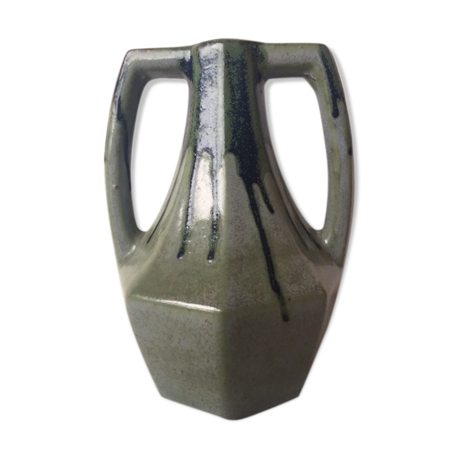 Ancient amphora vase in sand