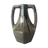 Ancient amphora vase in sand