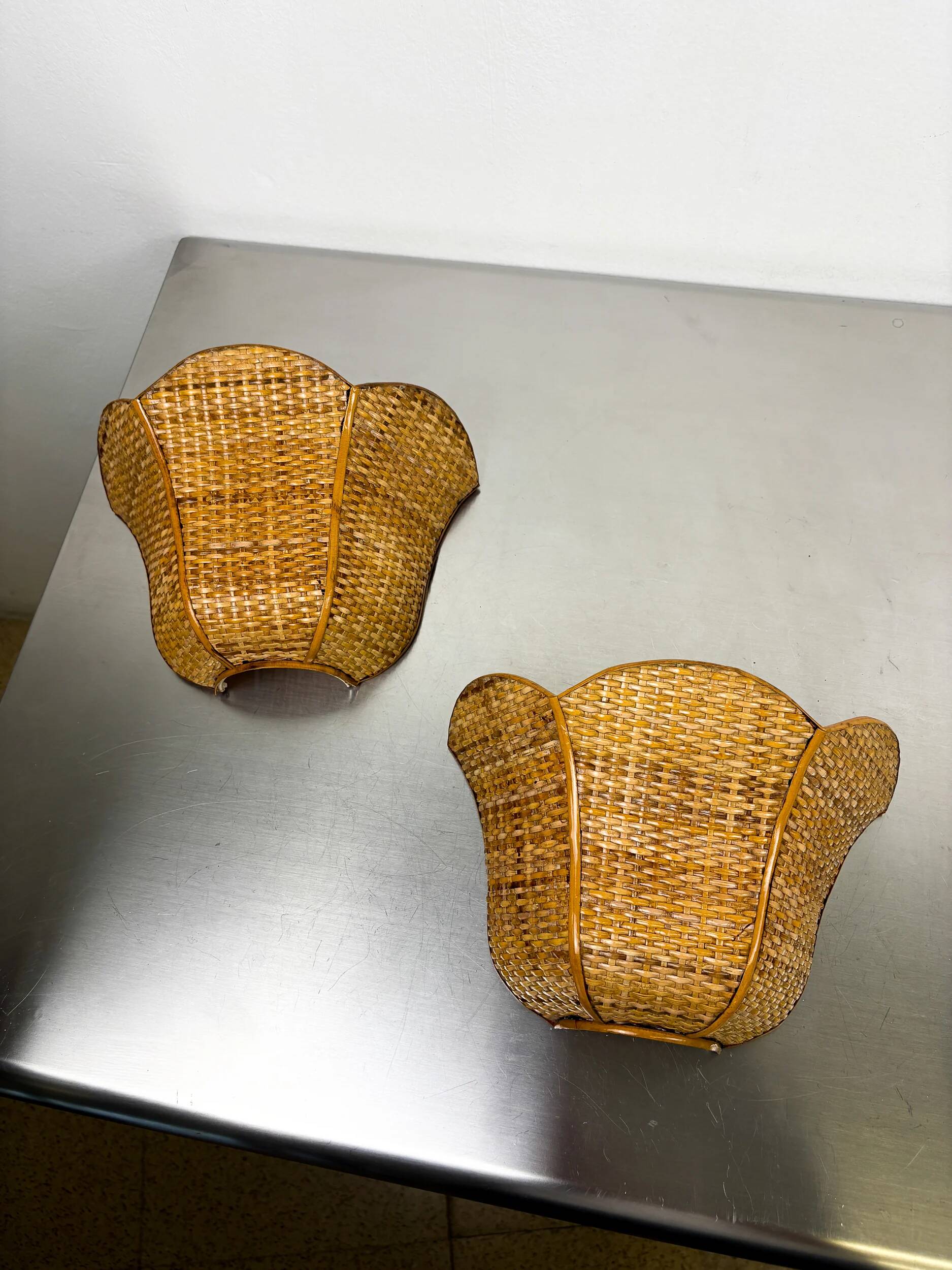 Pair of vintage woven rattan wall shades, Italy 1970s