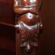 Hand-carved library circa 1900 in hardwood with Hermes statues.
