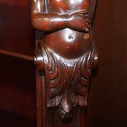 Bibliothèque sculptée à la main circa 1900 en bois dur avec statues Hermès