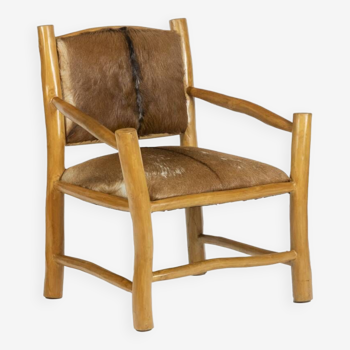 Brutalist style armchair in elm and goatskin, 1970s