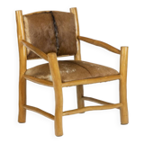Brutalist style armchair in elm and goatskin, 1970s