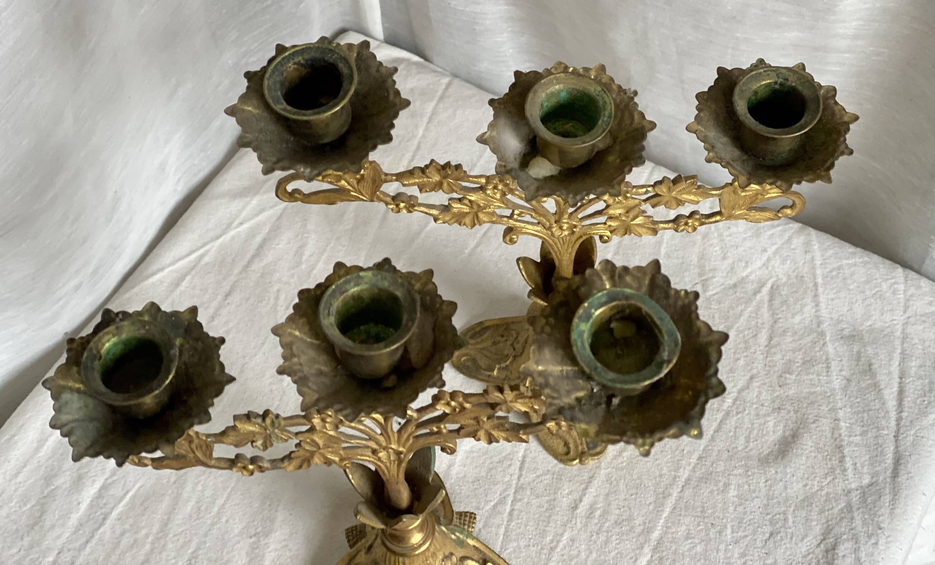 Set of 3 gilt metal candlesticks from the early 20th century.