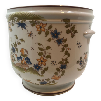 White earthenware planter with floral pattern