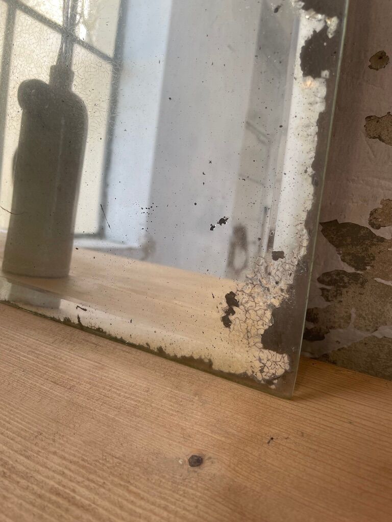 Very stung old bevelled mirror 39x60cm