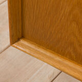 Scandinavian oak sideboard with sliding doors and 4 drawers
