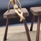 Pair of solid octagon cowhide tripod stools