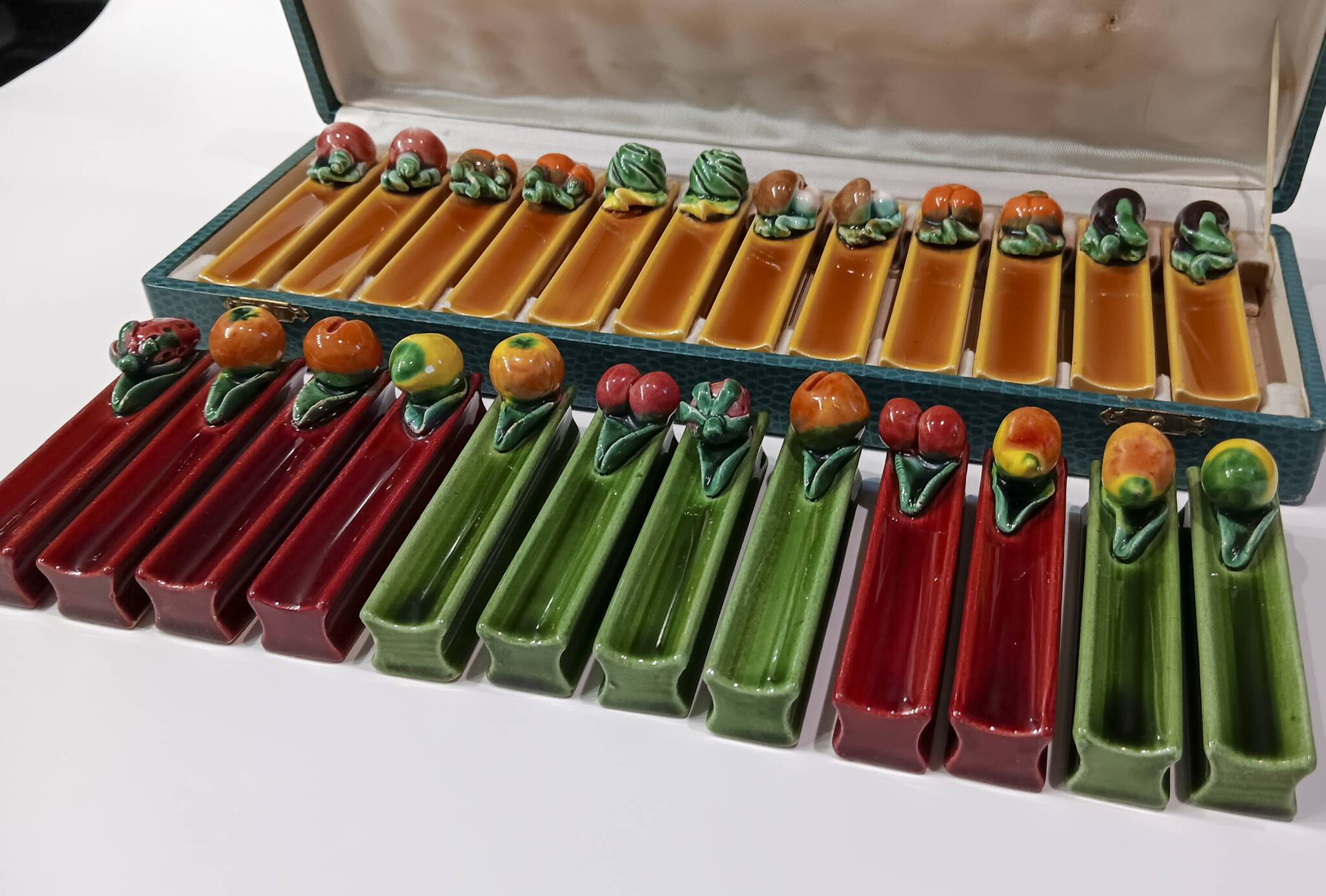 24 vintage Majolica Vallauris ceramic knife holders.