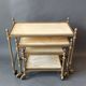 Neoclassical nesting trolleys in gilded brass and peach marble 1950/1960.