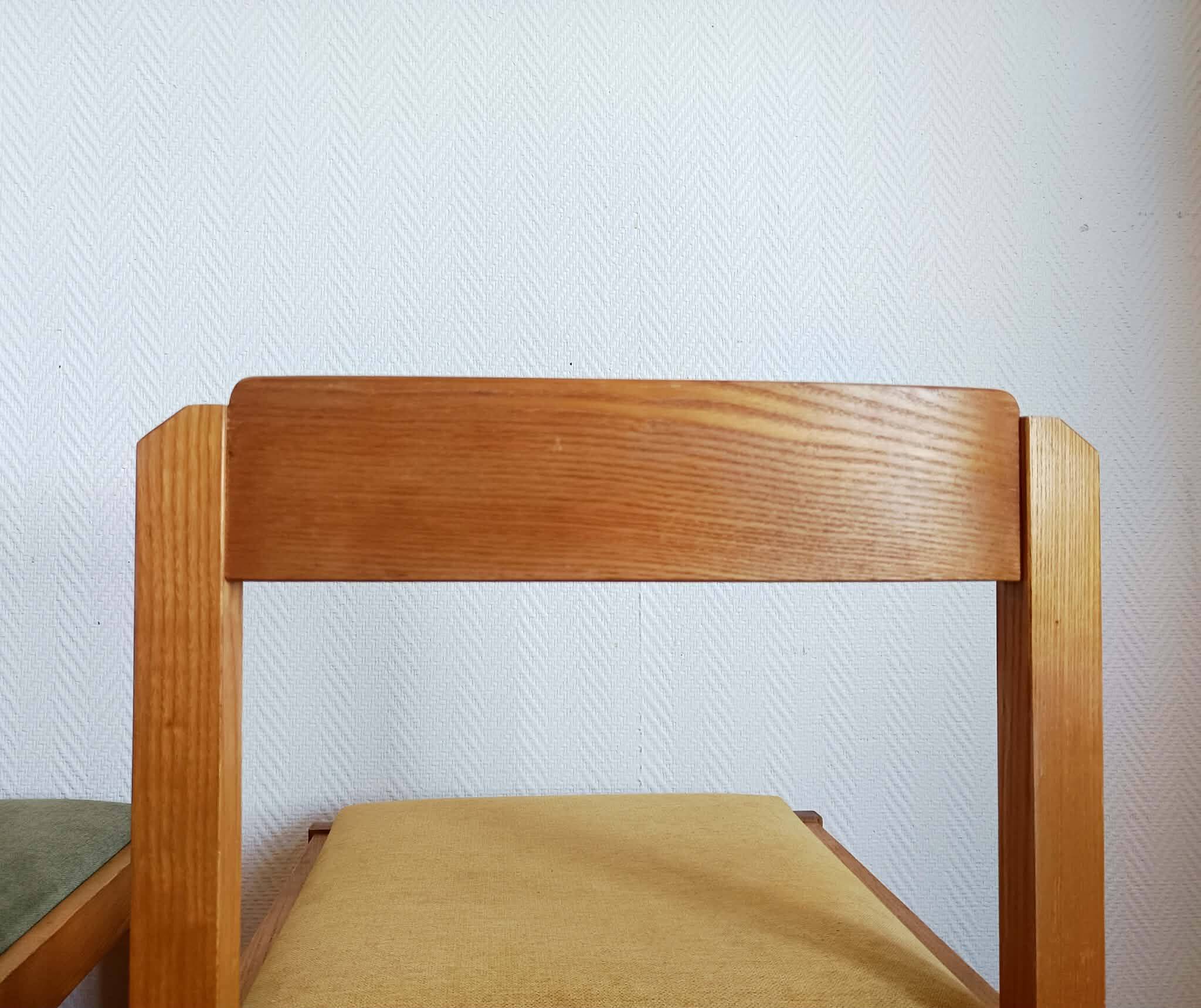 Six Scandinavian style chairs in elm and fabric.