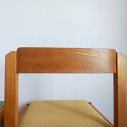 Six Scandinavian style chairs in elm and fabric.