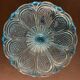 Fruit cup on blue-bubbled glass peder