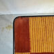 Vintage coffee table in laminate with geometric design, with tapered legs.
