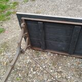 Antique bistro table with iron legs and wooden top