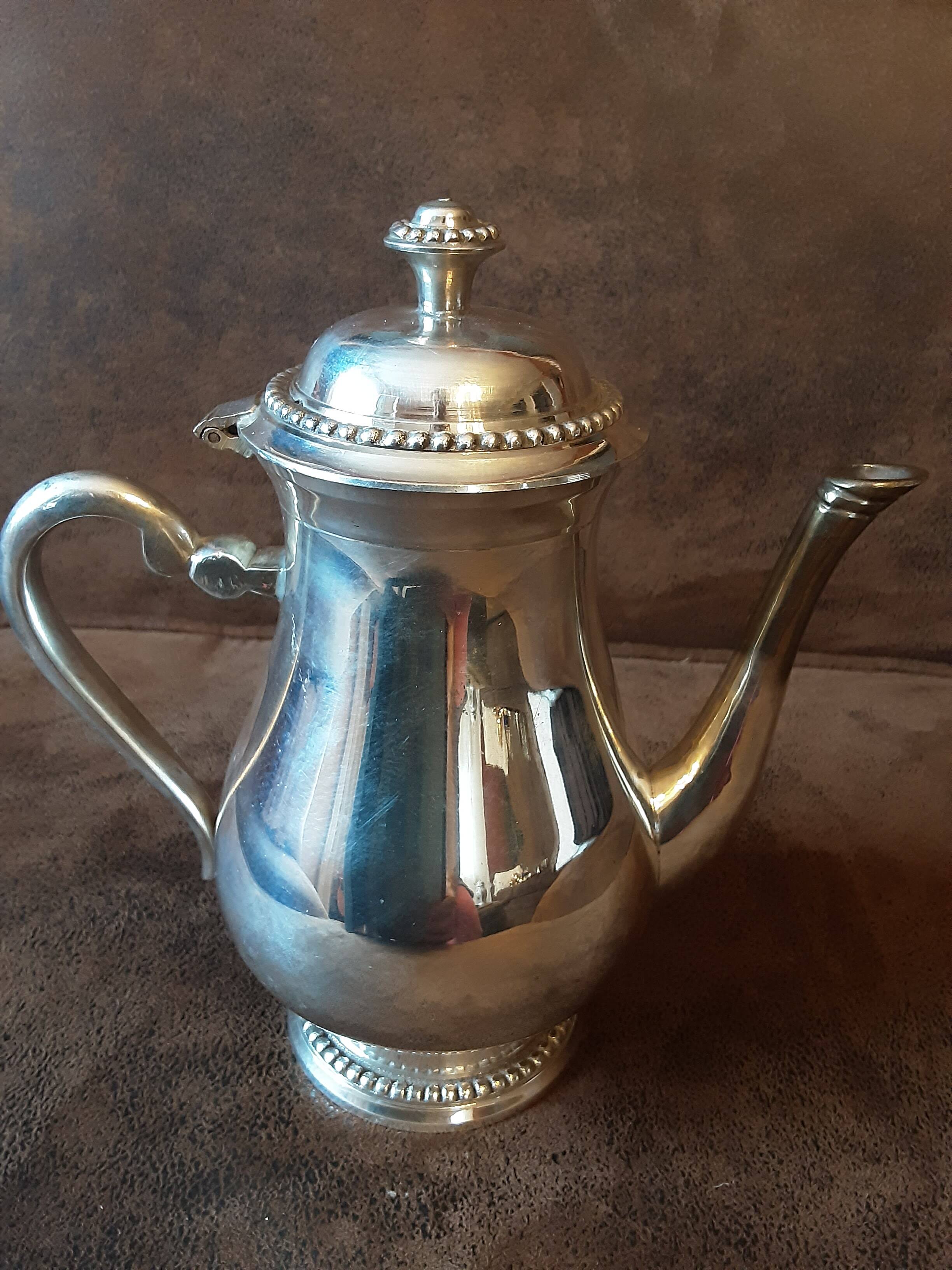 Silver metal teapot