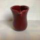 Old burgundy pitcher