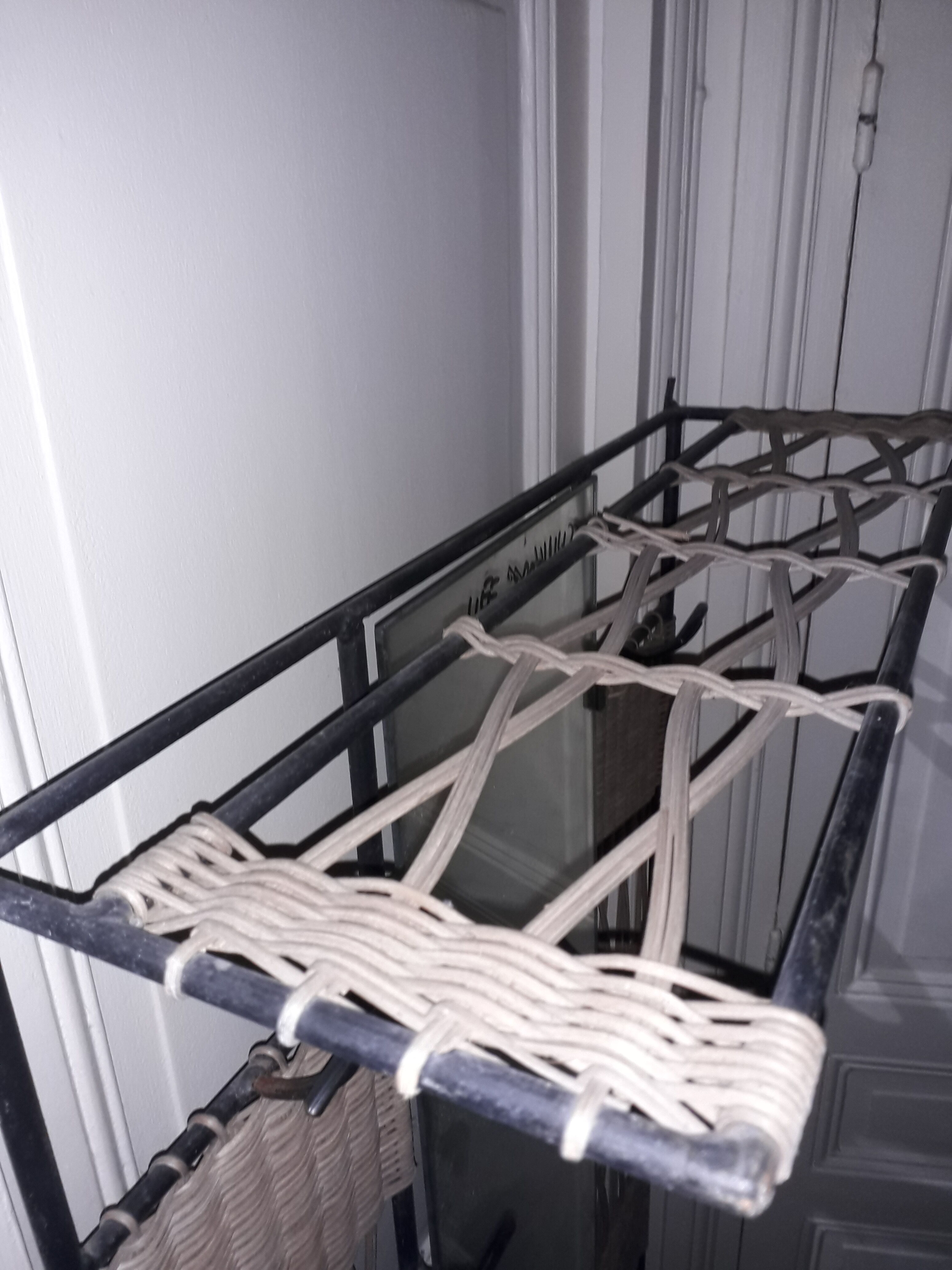 Metal and wicker coat holder