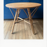 Round coffee table, in rattan and wood