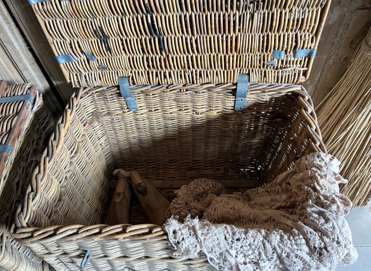 Old wicker moving trunk