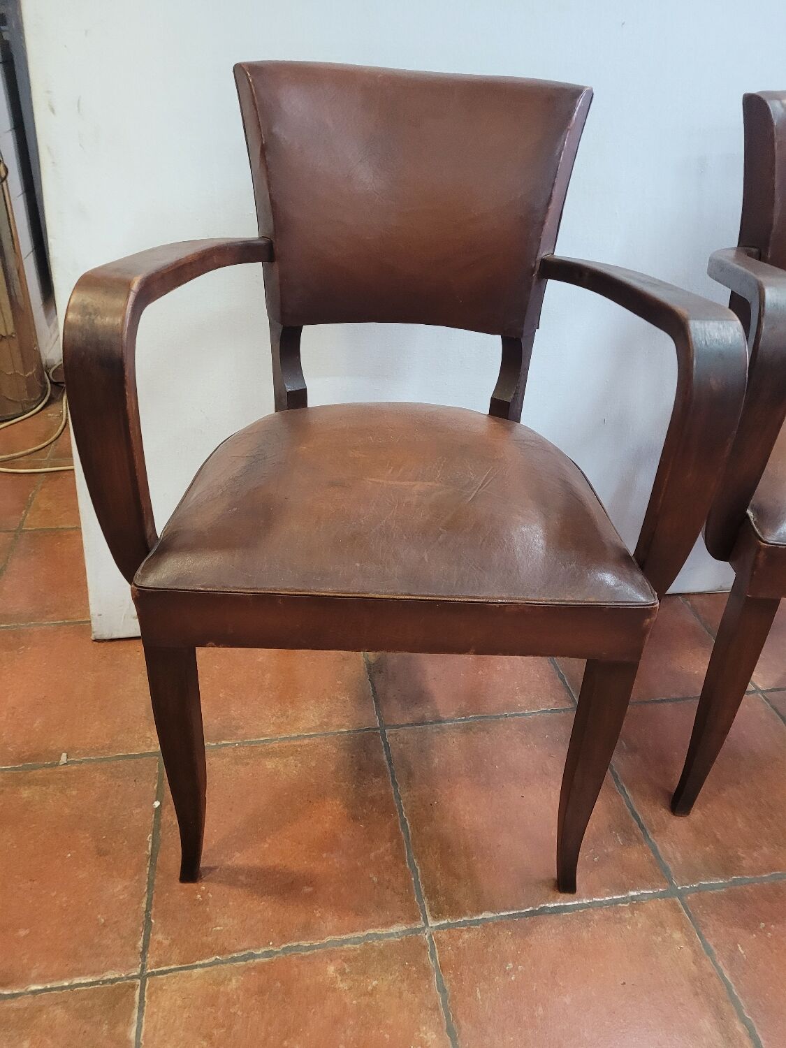 Pair of antique leather bridge armchairs
