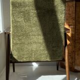 1970s green velvet armchair