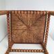 A wooden corner chair turned 1920s