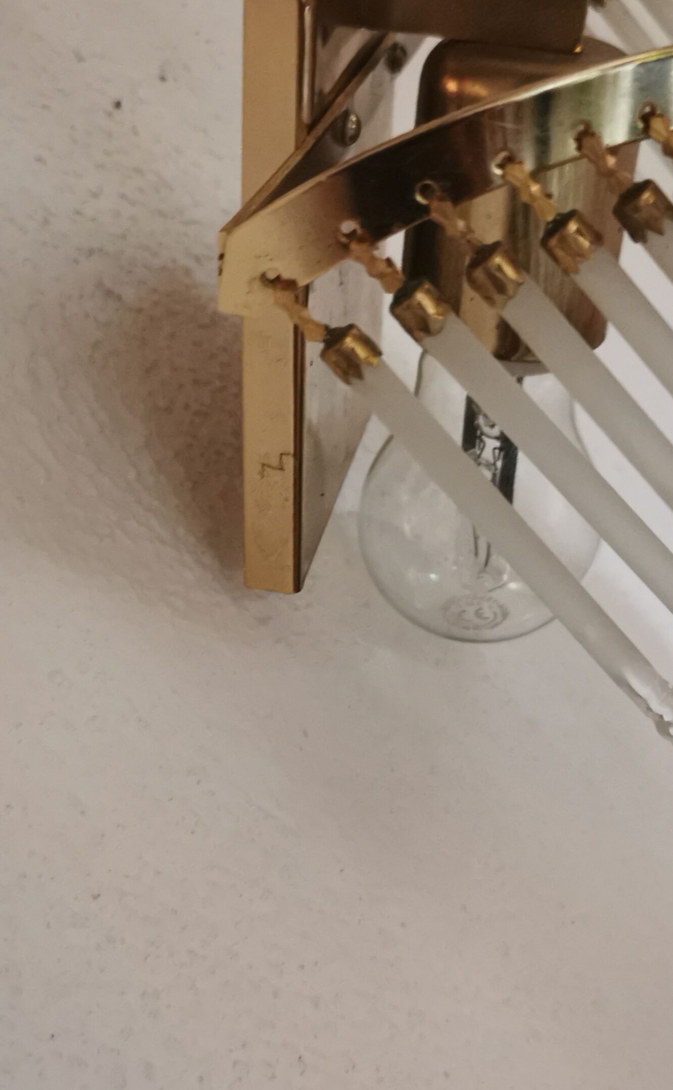 Vintage wall sconce gold metal and stamps