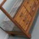 Antique British oak haberdashery cabinet, 1930s
