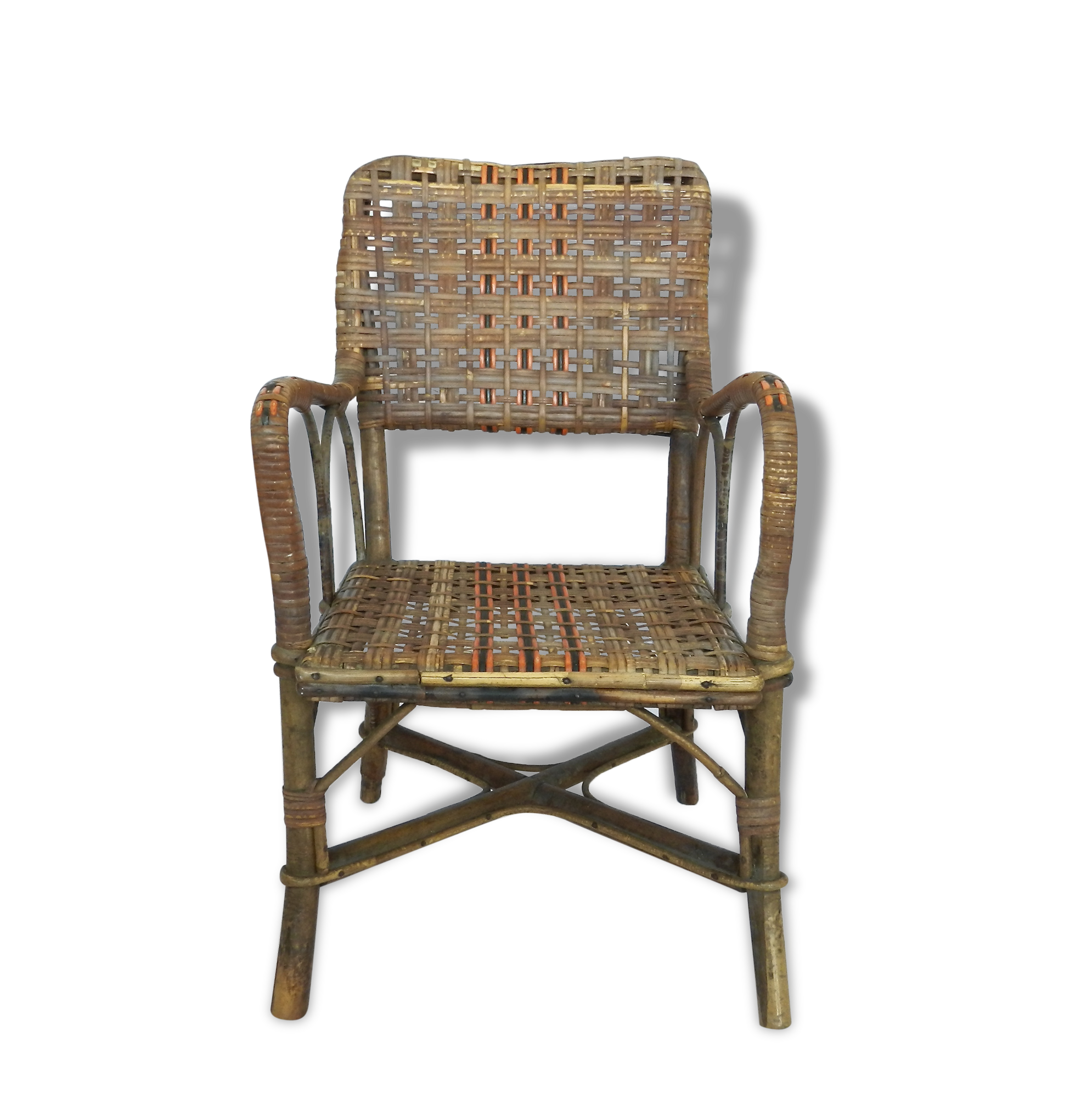 Small child vintage armchair in rattan