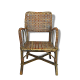 Small child vintage armchair in rattan