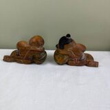 Serres-livres en bois sculpté