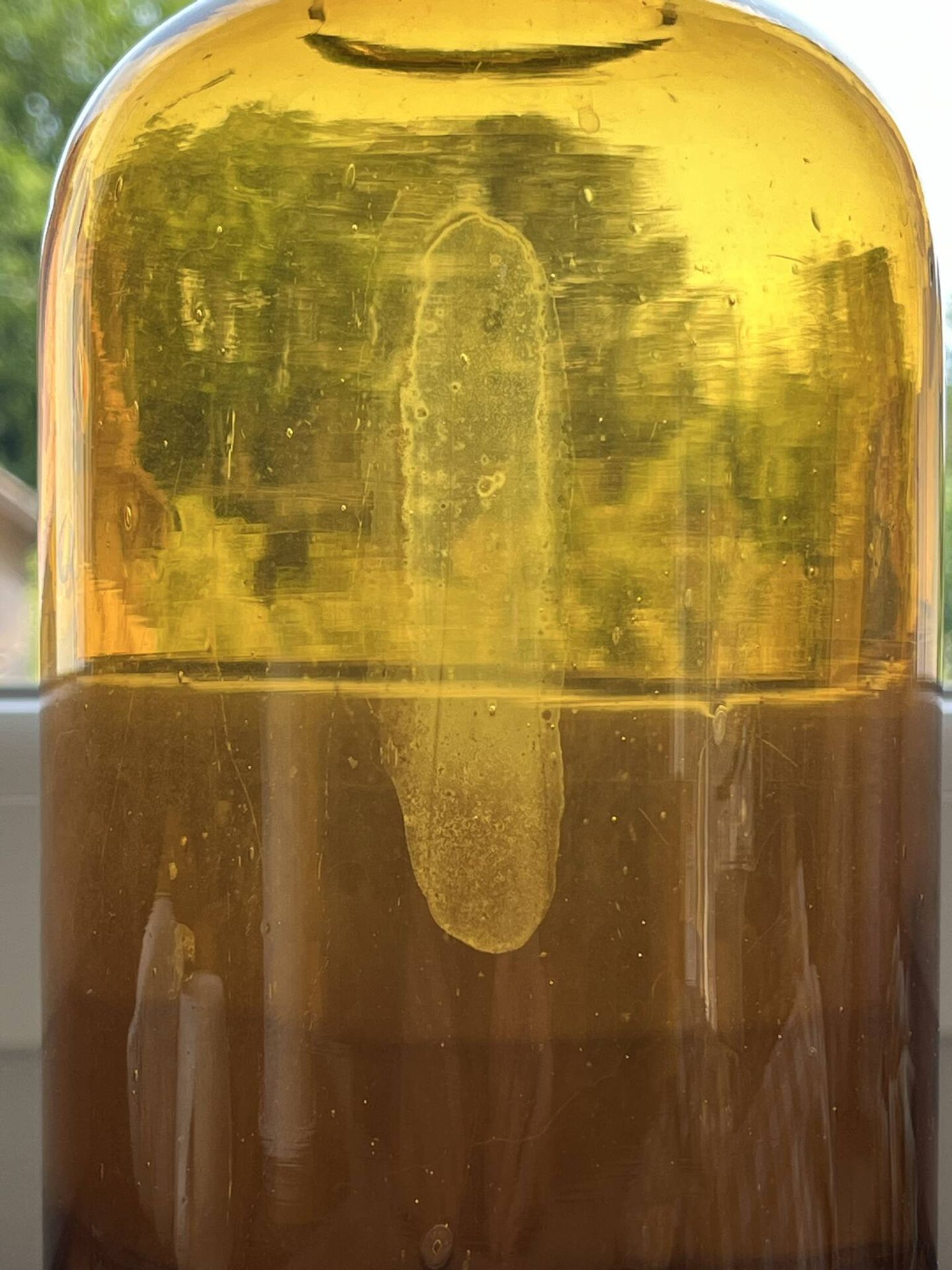 Amber glass vase bottle