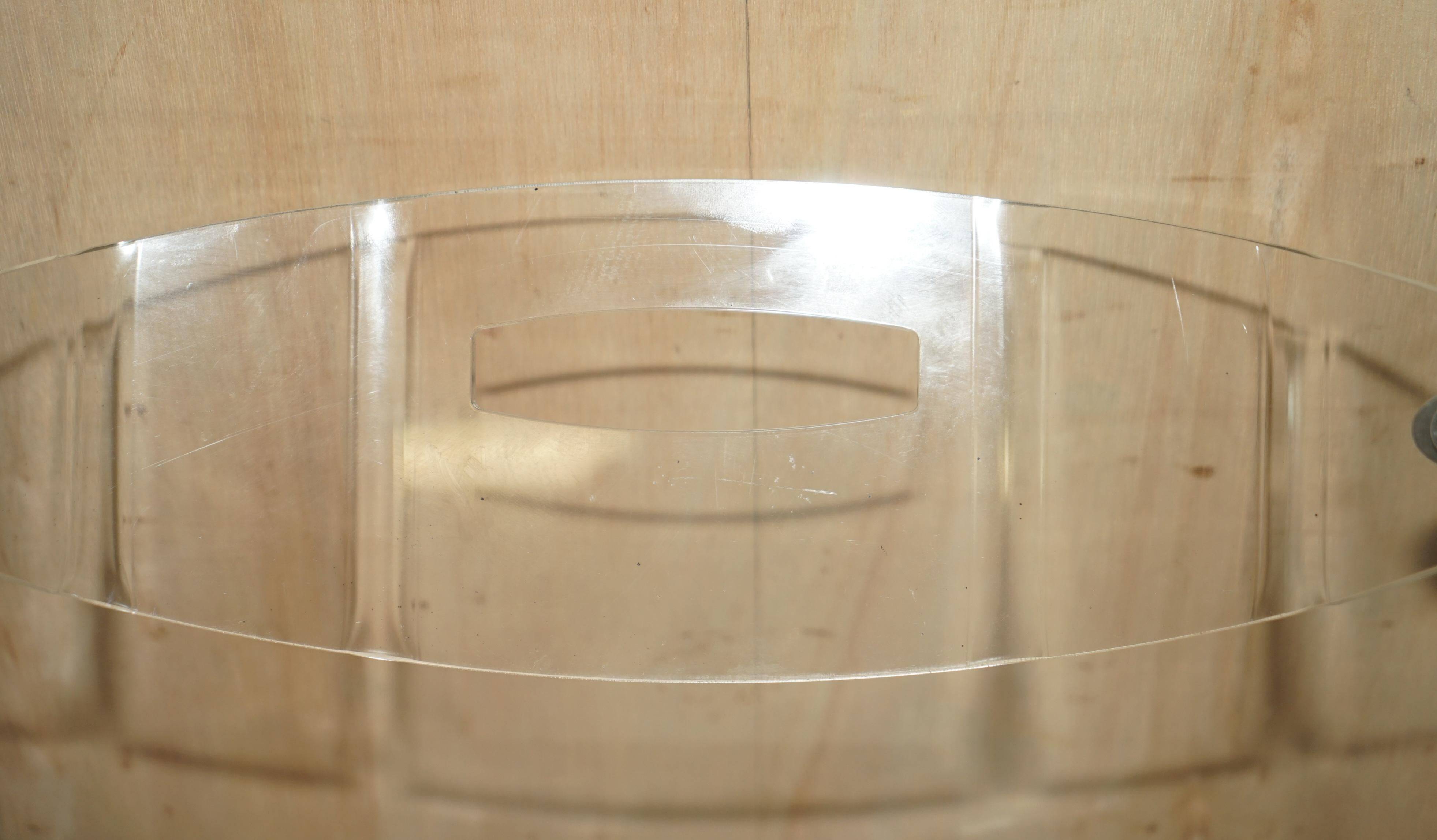 Metal and lucite folding chair, swivel backrest.