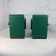 Pair of armrest heaters. Steel and green imitation leather. France, circa 1980