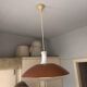 Rusty orange vintage metal pendant with opaline.