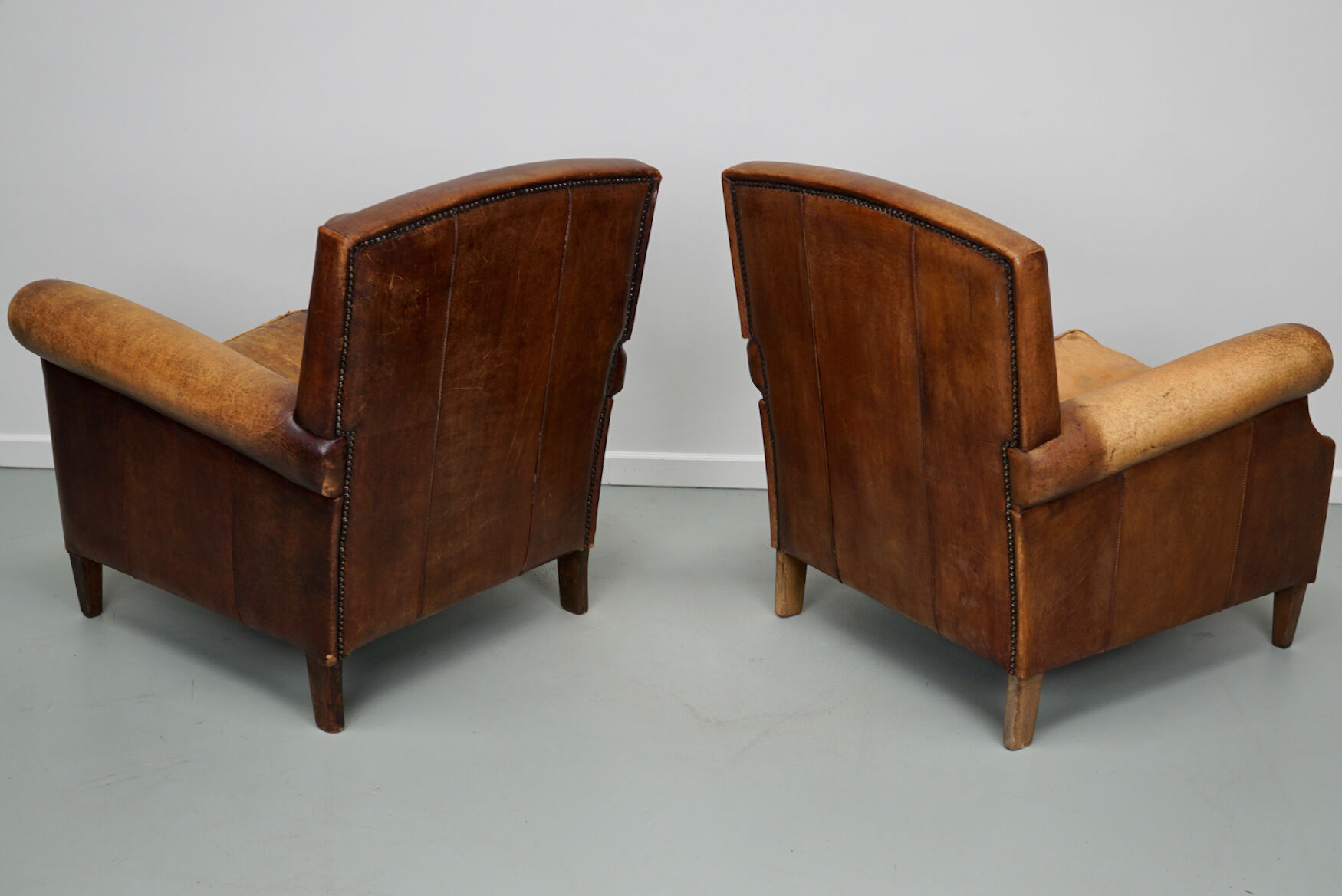 Vintage dutch cognac colored leather club chairs