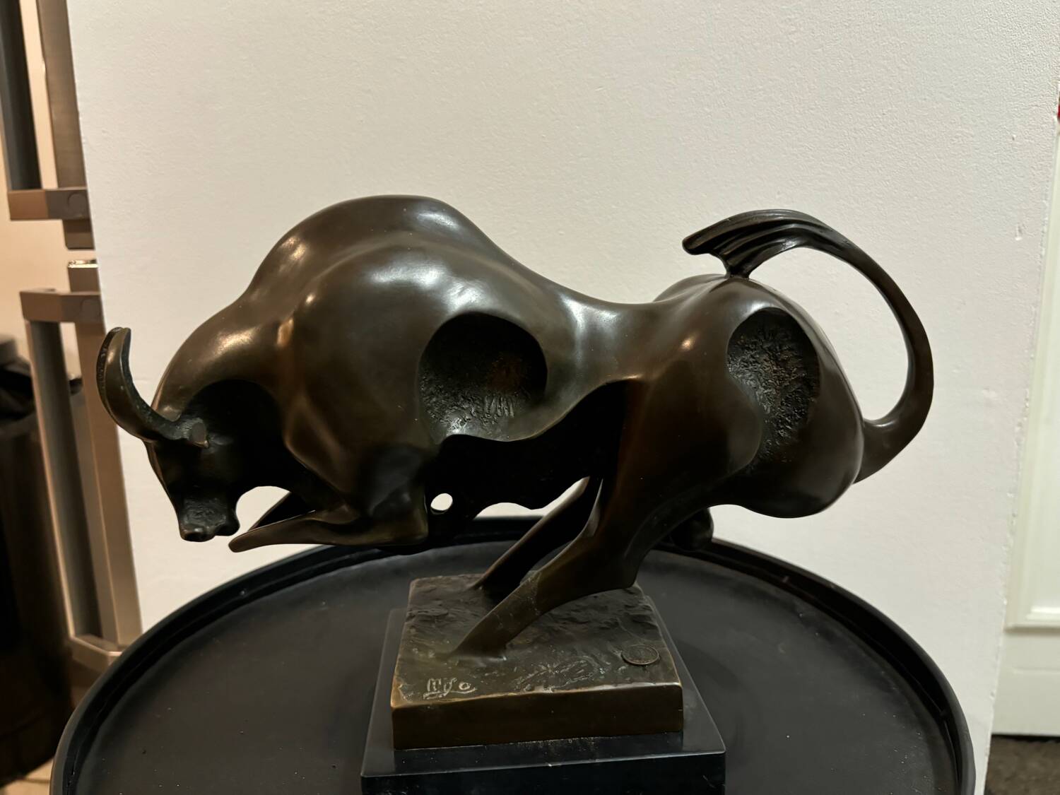 Bronze bull on marble base signed Milo