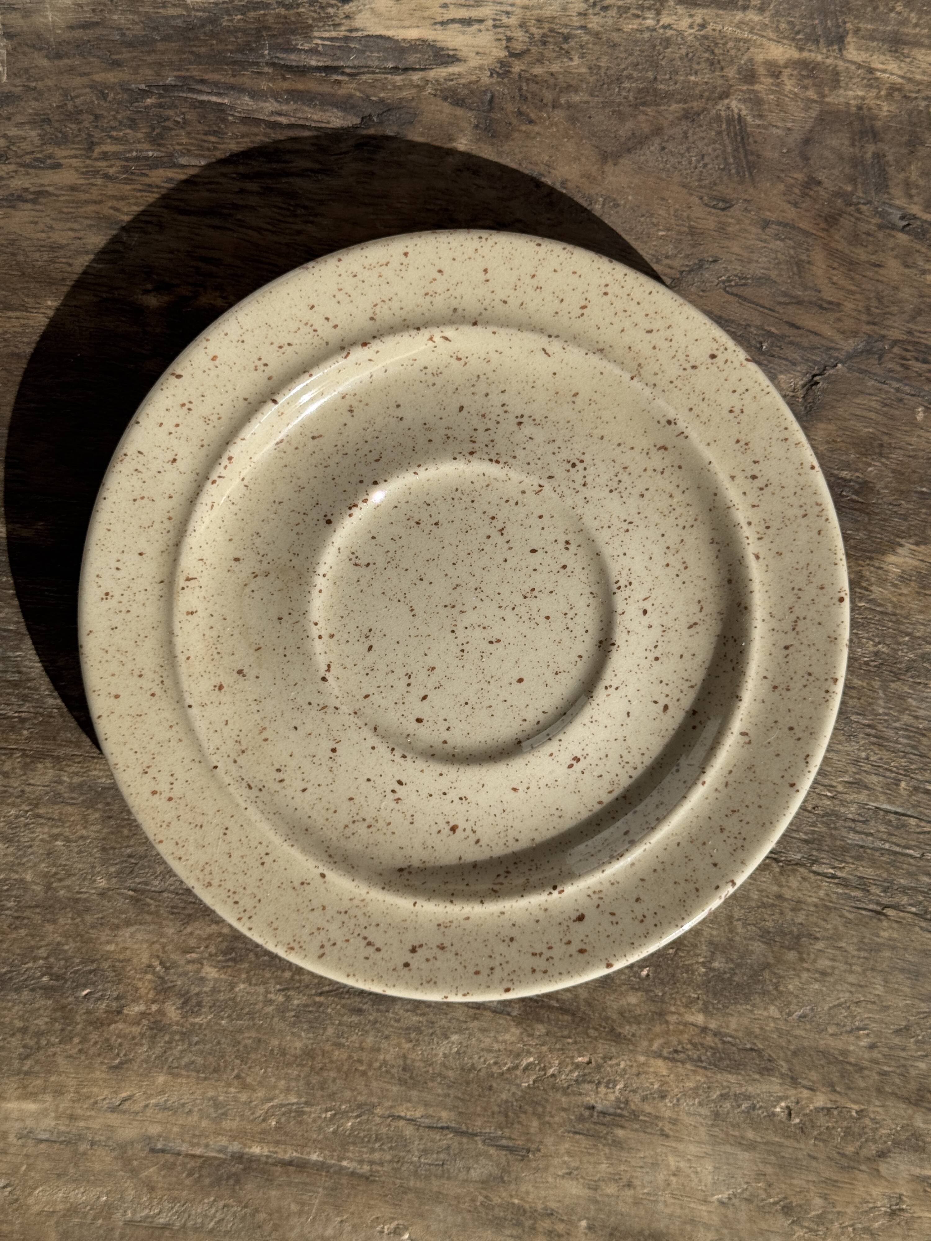 Set of 4 vintage speckled beige stoneware coffee cups.