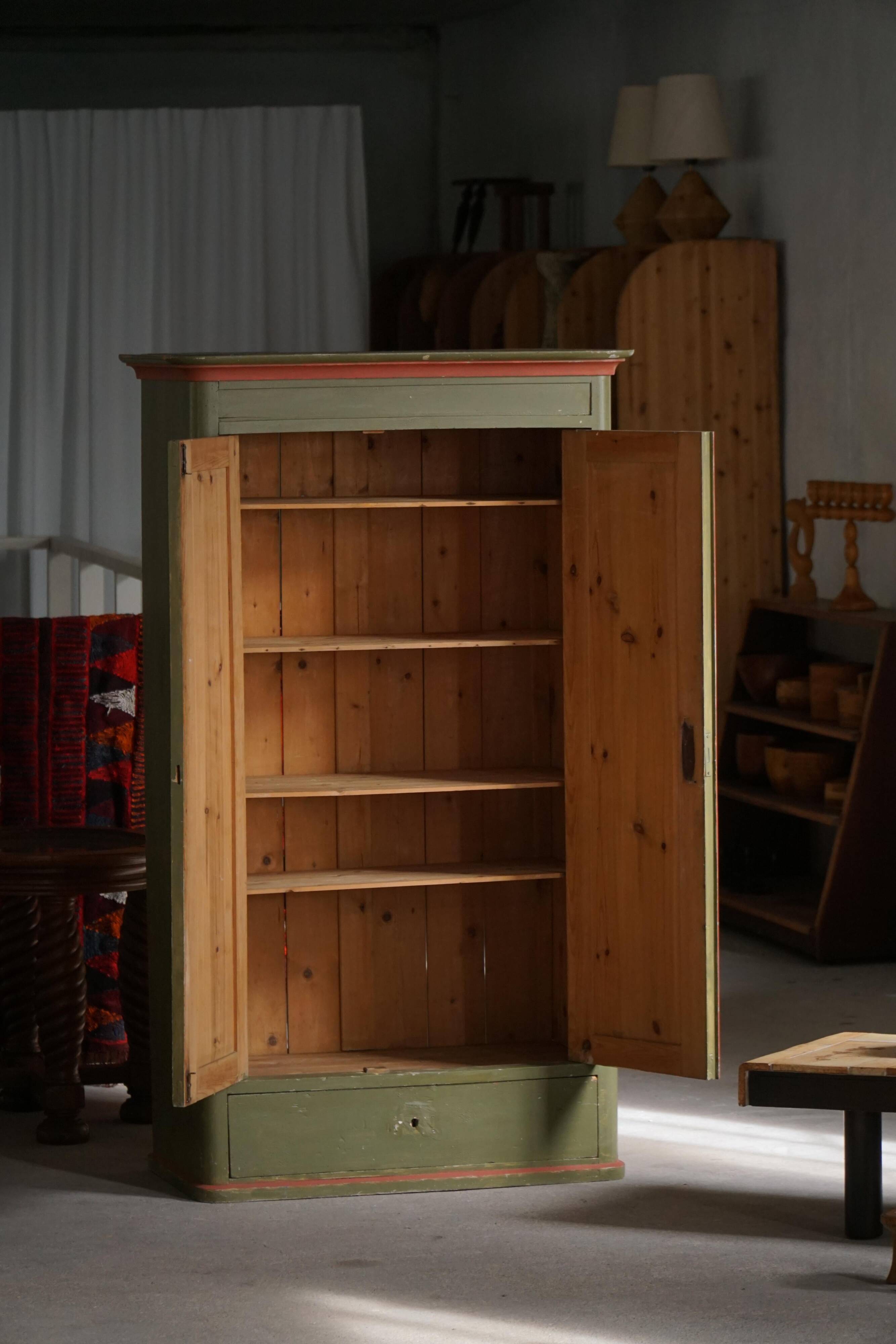 Old Danish cupboard painted with floral patterns, folk art, 19th century.